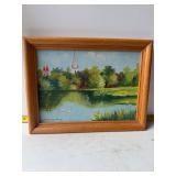 Framed tranquil landscape with a church