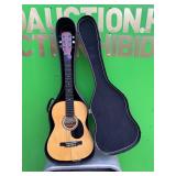 J Reynolds acoustic guitar and case