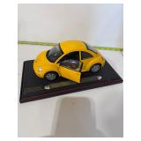 diecast model of a Volkswagen New Beetle