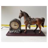 vintage equestrian-themed mantel clock