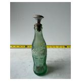 Coke bottle with laundry sprinkler