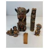 Native totem pole, figures group