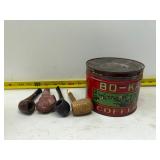 Coffee tin and pipes