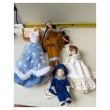 2 Barbie and 2 porcelain dolls