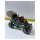 cast iron toy often called a 'horseless carriage'