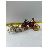 cast iron fire engine pump truck with a horse team