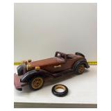 wooden model of a vintage automobile