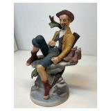 ceramic figurine of a sleeping man w/ pipe & boots