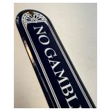 No gambling enameled sign