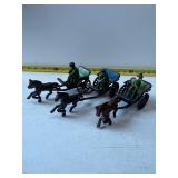 Three cast iron horse-drawn carriage toys