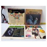 four vintage vinyl records