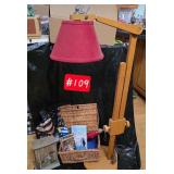 Lamp, bsket, 2 umbrellas, 2 books, outhouse...