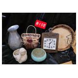 Clock, baskets, metal pitcher, Virgin Mary...