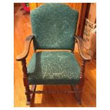 Green antique rocking chair