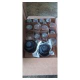 Small drink glasses and amber glass canisters