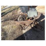 Metal wheelbarrow full of Scrap metal