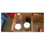Assorted glass jars and jugs