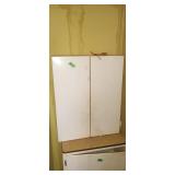 Metal wall cabinet and contents