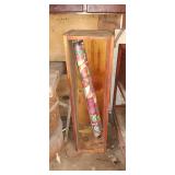 Wood crate and rolls of weed barrier