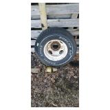 Dunlop a/t radial rover 235/85r16 tire on rim