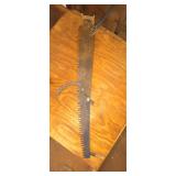 One man crosscut saw and hand sickle
