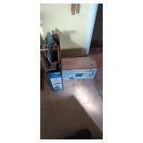 Assorted decor, expanding hanger racks, and