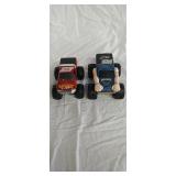 Pair of diecast body toy monster trucks 4.5' tall