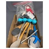 Kitchen gadgets, spatulas, wisks, chip bag clips