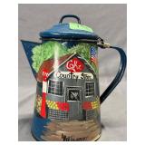 Blue speckled enamelware coffee pot