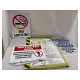 Sign assortment, restricted area, no smokkng