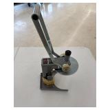 Radia Lid Press with Adjustable Base