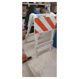 Plastic traffic barricade, has some damage,