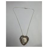 Silver Tone Necklace with Heart Shaped Pendant