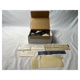 Assortment of Empty Stamp Holders in Various Sizes