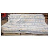 Quilted bed spread, staining