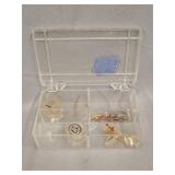 Spinner bait pieces in plastic case