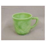 Jadeite child's tea cup 2.5'x3'