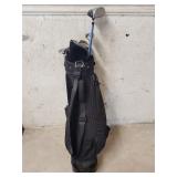 Knight golf bag with assorted golf clubs