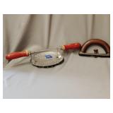 Potato masher, wood sad iron handle