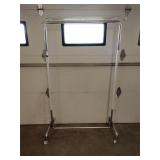 Rolling clothes rack