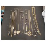 Large lot of gold toned jewelry