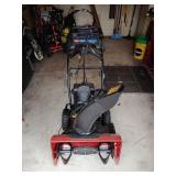 Toro gas powered snowblower, snow master 724 QXE