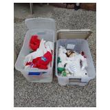 Two totes with lids and Christmas decor and plush