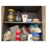 Contents of Cabinet , tins, vase , miscellaneous