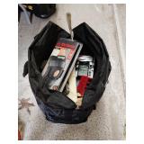 Tote with knee brace, game, clock and misc.