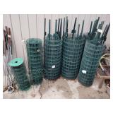 Assorted rolls of garden fence and posts