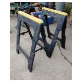 2 plastic saw horses