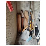 Brooms, shovel, loppers, wood