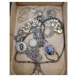 Necklaces, pendents, buttons, coin pendents