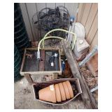 Clay flower pots, metal decor panels, hose and